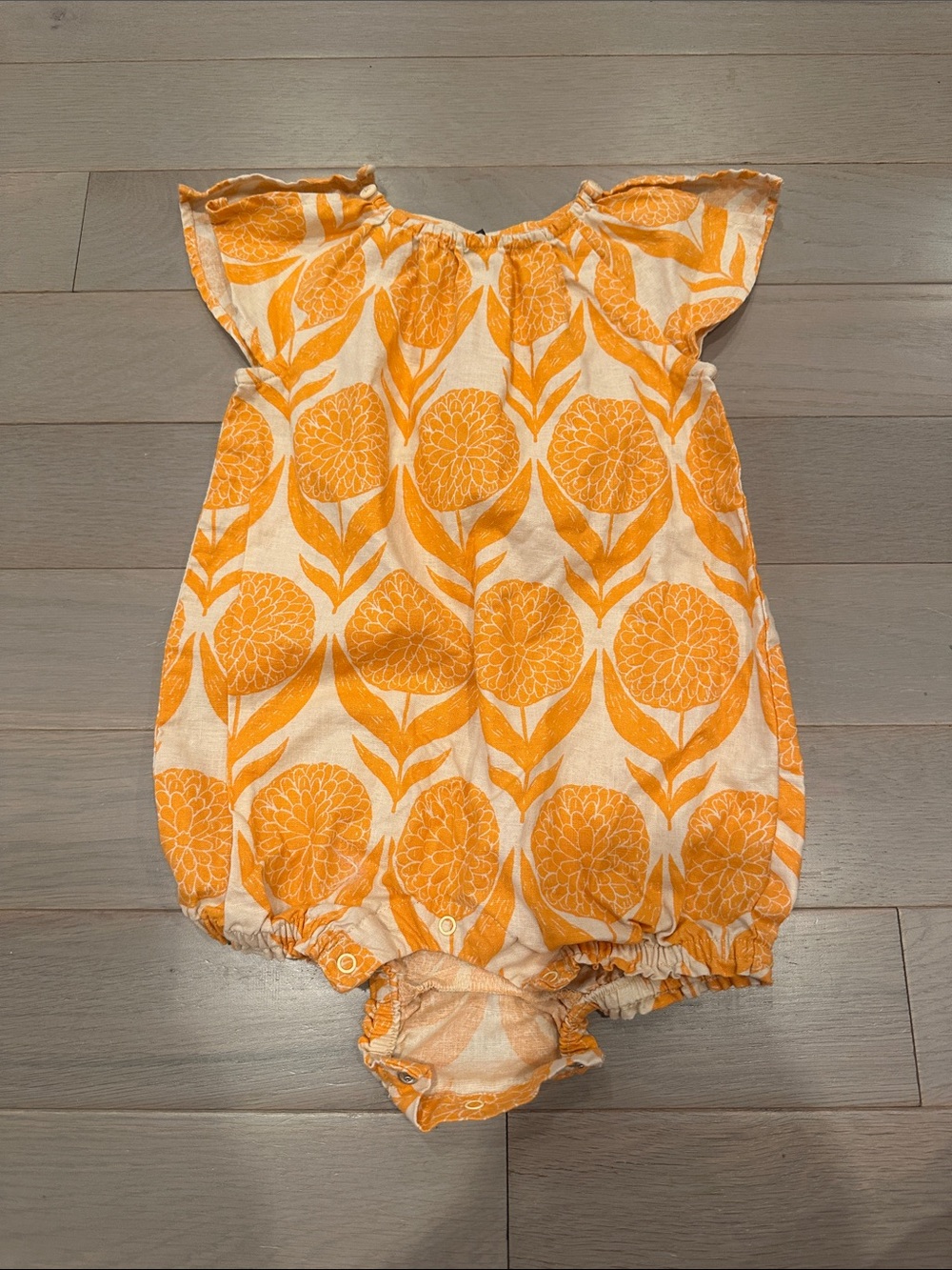 Tea Collection Orange and White Floral Baby Romper